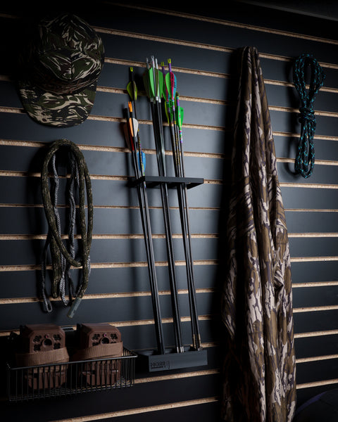 Detail of slatwall mounting clip on black slatwall panel